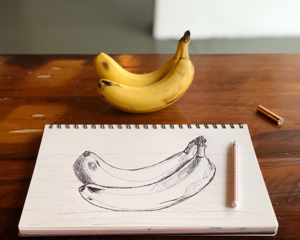 Screen distancing is sketching of a pair of bananas