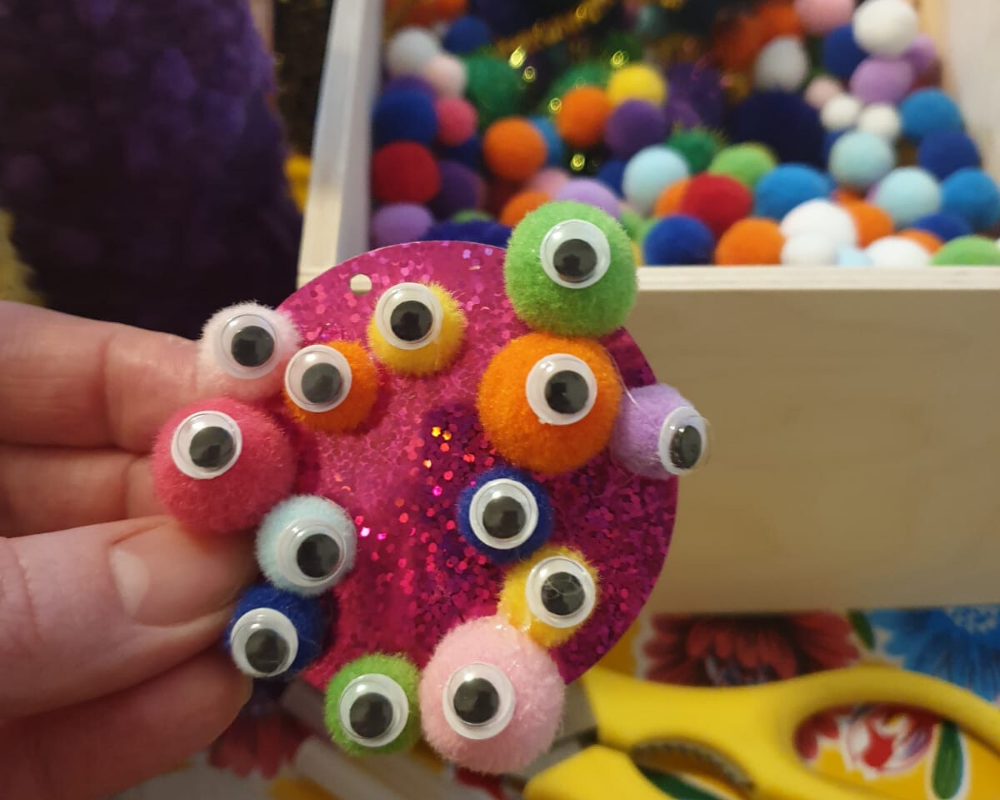 Amy's Crafternoon earrings with pom poms and googly eyes. Cork & Chroma