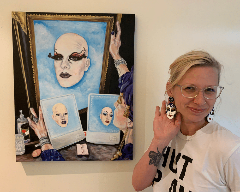 Hillary standing with her portrait of Sellma Soul