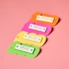 Cork & Chroma's four Painter Affirmation (soft enamel) Pins in neon colours