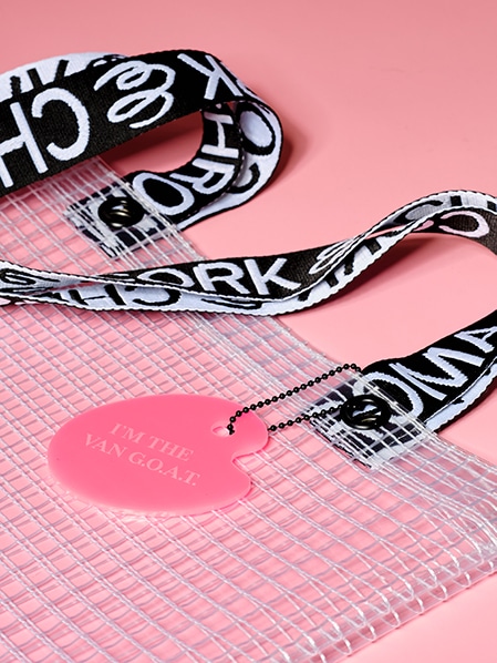 Cropped detail shot of PVC&C Tote Bag by Cork & Chroma with neon pink Smol Palette Keychain