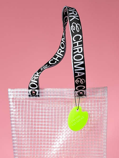 Cropped shot of PVC&C Tote Bag by Cork & Chroma with neon green Smol Palette Keychain