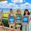 Guests with paintings from Cork & Chroma paint and sip session in Yarra Valley